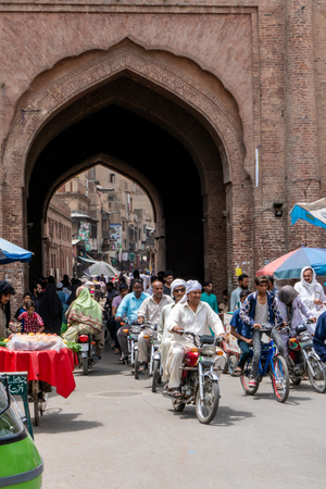 Lahore, Pakistan - August 5, 2018: Busy street in historical town of Lahore, Pakistan. Illustrative editorial.のeditorial素材