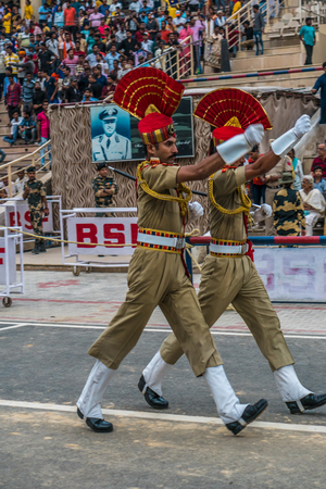 India, Border with Pakistan - August 6, 2018: Soldiers marching during military parade on the border between India and Pakistan. Illustrative editorial.のeditorial素材