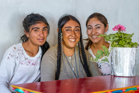 Ladakh, India - August 29, 2018: Portrait of indigenous smiling young women in Ladakh, India. Illustrative editorial.のeditorial素材