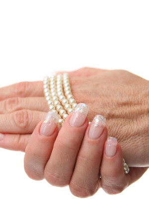 Feminine nails and pearls - studio shootの写真素材