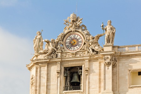 Clock and bell at St. Peter's Basilica in the Vatican - outdoor imageの写真素材