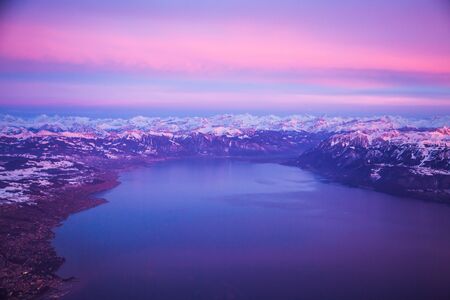 Aerial panorama of Lake Geneva and Alps during sunset, Switzerlandの写真素材