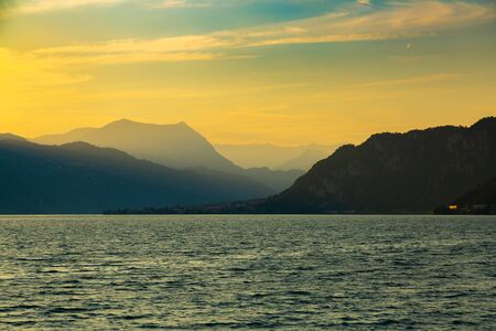 Idyllic sunset over Lake Como next to Lecco city, Lombardy, Italyの写真素材