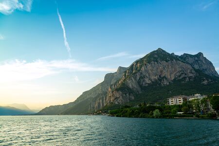 Lake Como surrounded by mountains over Lecco city, Lombardy, Italyの写真素材