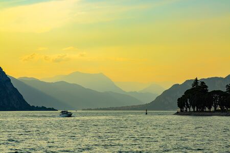Idyllic sunset over Lake Como next to Lecco city, Lombardy, Italyの写真素材