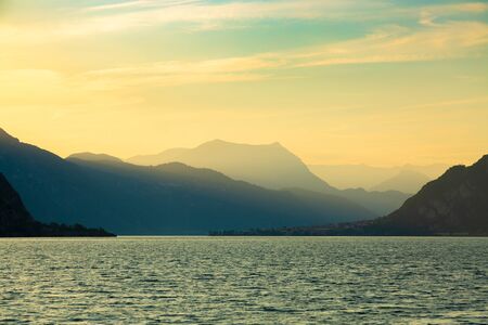 Idyllic sunset over Lake Como next to Lecco city, Lombardy, Italyの写真素材