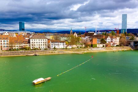 Basel architecture along Rhine River and river crossing in Basel, Basel-Stadt in Switzerland.
