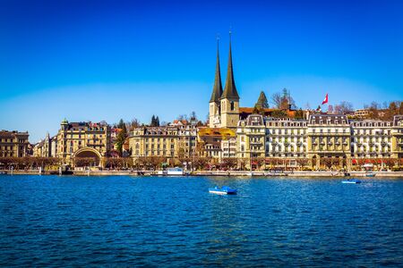 View from Lake Lucerne to Lucerne old town buildings in Switzerlandの写真素材