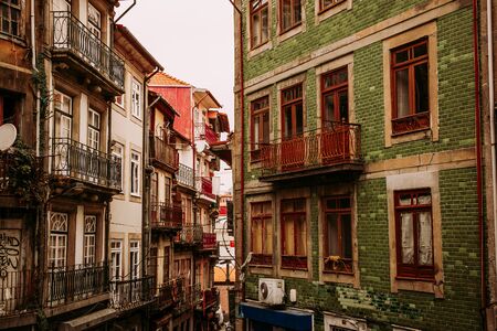 Typical historical old town houses with azulejos decoration in Porto city, Portugalの写真素材