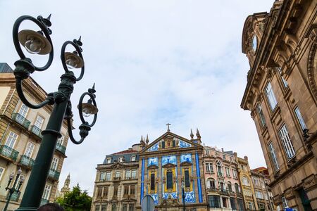 Almeida Garrett Square with San Antonio dos congregados church and Sao Bento railway station buildings in Porto city, Portugalの写真素材