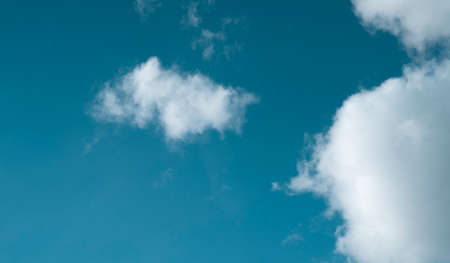 clouds on the background of the blue skyの写真素材