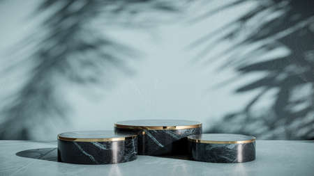 Podium stand made with marble and gold, decorated with plant leaves. Mockup, template exhibition for products.の写真素材