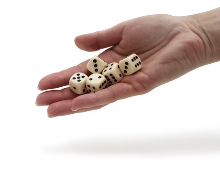 Throwing white gambling dices isolated on white