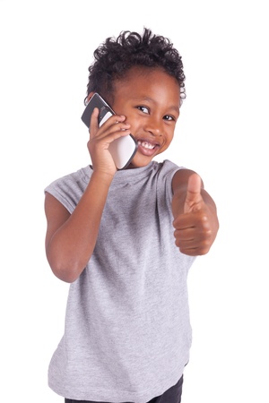Portrait of happy joyful beautiful little boy isolated on white backgroundの写真素材