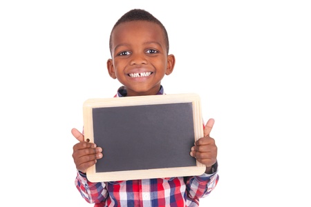 Adorable african little boy  with slateの写真素材