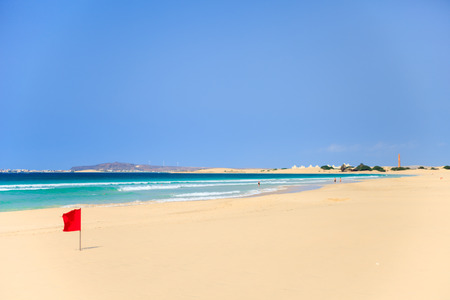 red flag on the beach in Boavista, Cape Verde - Cabo Verdeの写真素材