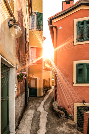 sunset between the housesの写真素材