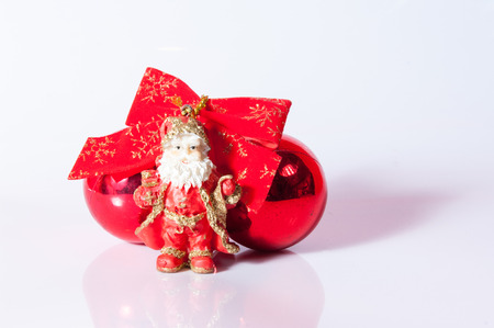 Santa Claus toy with red ballsの写真素材