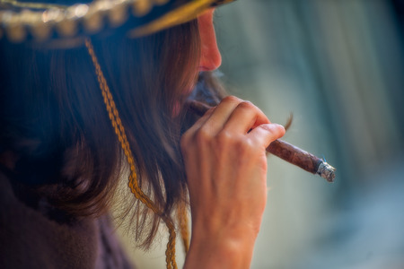 Mexican girl with sigaroの写真素材