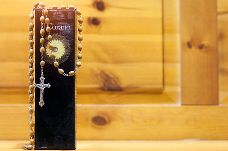 the Koran and the christian crucifixの写真素材