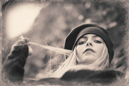 Image with old style blond woman portraitの写真素材