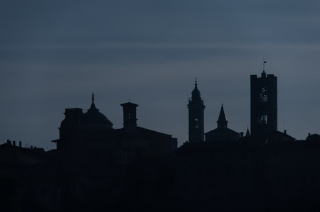 Silhouette of Bergamo high - citta alta - Italyの写真素材