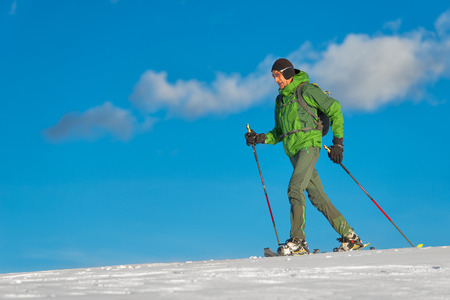 Beautiful shot of hiker in winter season.の写真素材