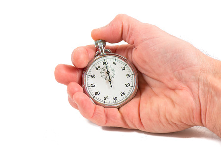 Hand holding stopwatch ready to shoot. On white backgroundの写真素材