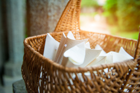 basket full of bags of rice for the bride and groom.の写真素材