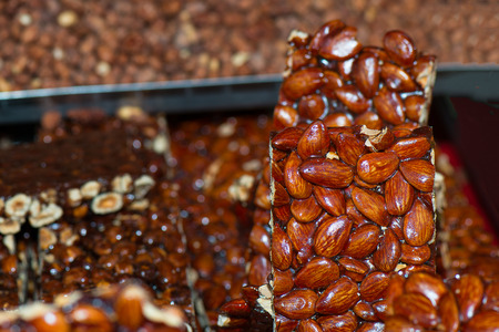 Crunchy almonds and sugar to the street markets in Italy