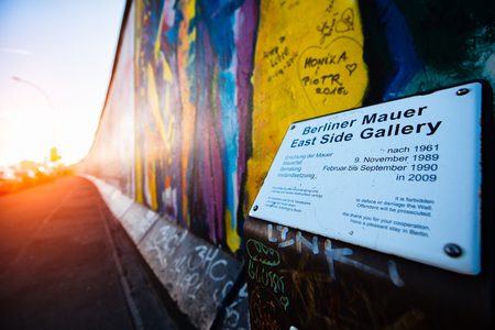 Berlin , Germany - November  28, 2016: East Side Gallery Berlin Wall international memorial to freedom. entirely painted with graffitiのeditorial素材
