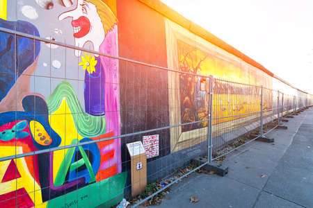 Berlin , Germany - November  28, 2016: East Side Gallery Berlin Wall international memorial to freedom. entirely painted with graffitiのeditorial素材