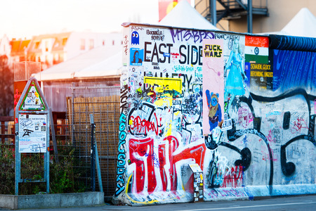 Berlin , Germany - November  28, 2016: East Side Gallery Berlin Wall international memorial to freedom. entirely painted with graffitiのeditorial素材