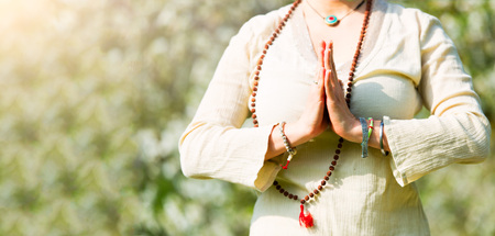 Yoga position in a girl's prayer.
