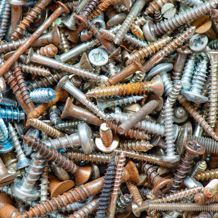 Various screws used and rusty on close-upの写真素材