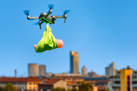 The stork that brings a newborn baby in a modern style Transformed by drone.の写真素材