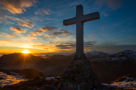 Cross a mountain in the magical sunset colors.の写真素材