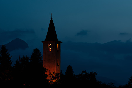 The small church of Sils Maria on Lake Sils near Sankt Moritz.の写真素材