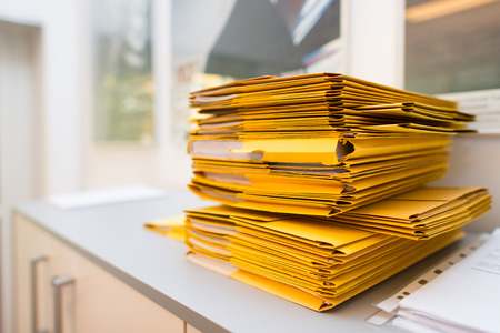 Pack of folders with documents in the office.の写真素材