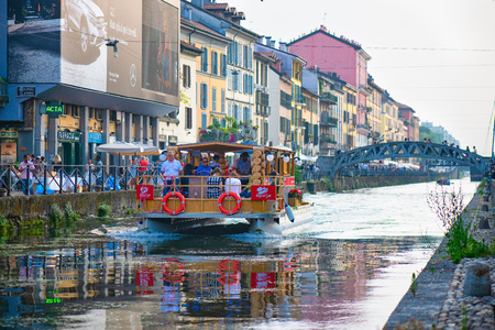 Milan, Italy - may, 30, 2018 : Tourist navigation on Naviglio Pavese, in Milan, Lombardy, Italy.のeditorial素材