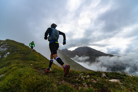 Zorzone Serina italy 2 September 2018: Extreme mountain race competition skymarathon. two athletes competing uphillのeditorial素材