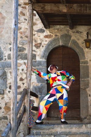 The mask of Arlecchino. Play outside the homeのeditorial素材