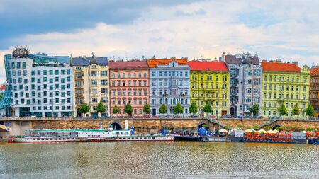 Prague, Czech Republic - 5 September 2019: Multicolored buildings in Prague on the Moldavian riverのeditorial素材