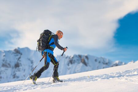 Ski mountaineering in action with seal skinsの写真素材