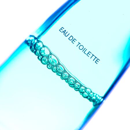 Detail of flask of eau de toilette on a white backgroundの写真素材