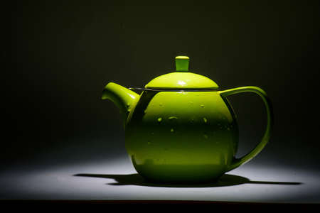 Cup for herbal tea on a black backgroundの写真素材