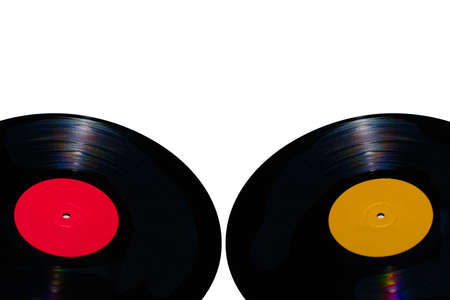 Two 33 rpm vinyl records on white backgrounds