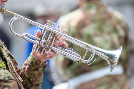 Detail of a trumpet played by a soldier during a paradeの写真素材