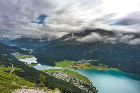 View from above of Silvaplana and Surlej in the Engadine valley Switzerlandの写真素材