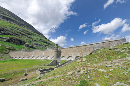 Gravity dam of the White lake Bernina Swiss alpsの写真素材